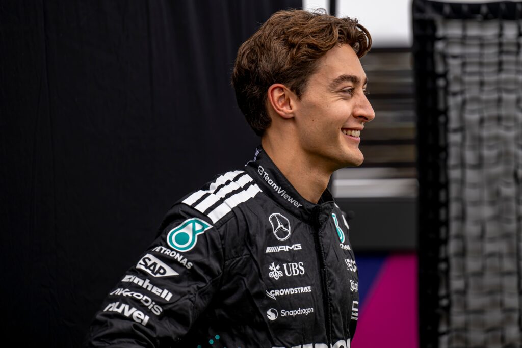 Russell Dominates Singapore as McLaren Teammates Clash